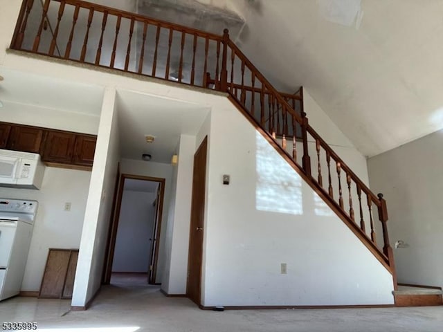 stairs with a towering ceiling