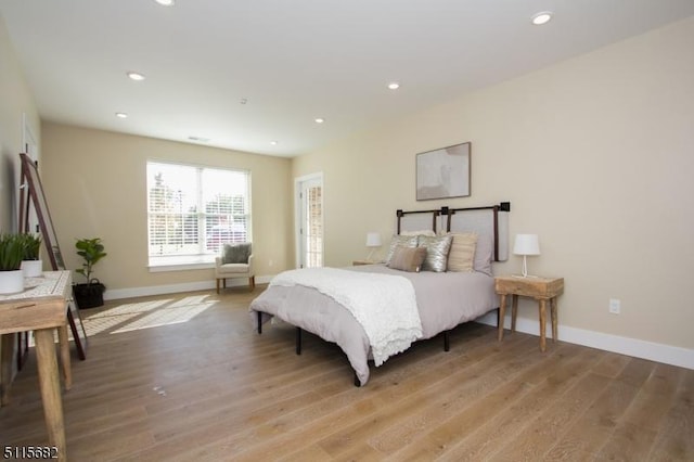 bedroom featuring light hardwood / wood-style floors