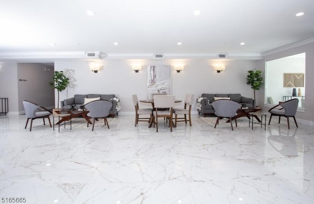 dining room with ornamental molding