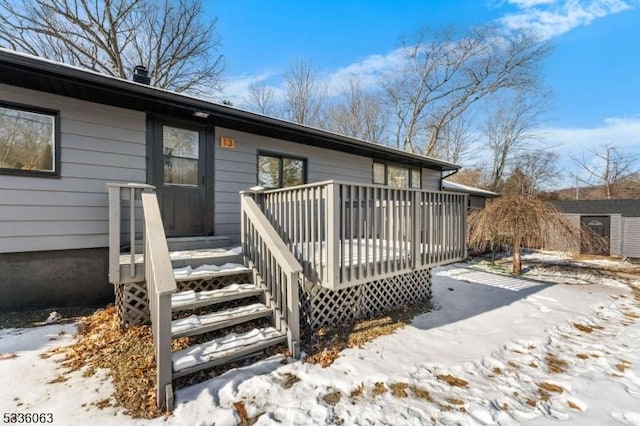 exterior space featuring a wooden deck