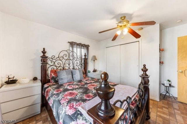 bedroom featuring a closet and ceiling fan