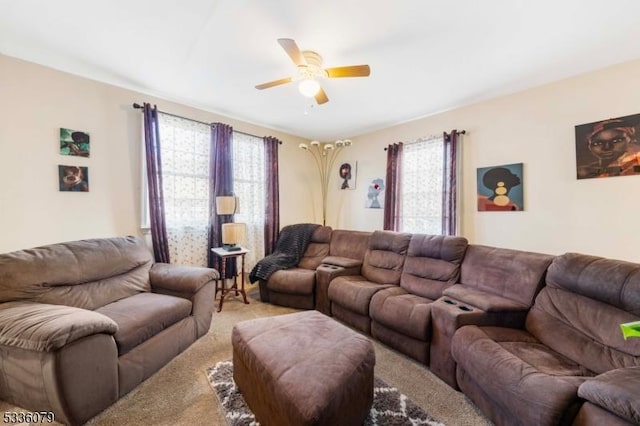 living room featuring ceiling fan and carpet flooring