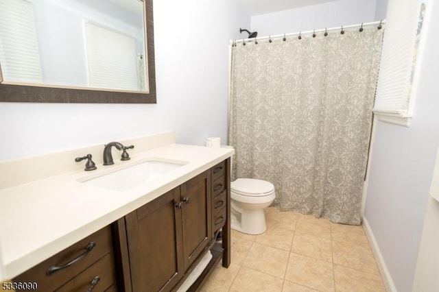 full bathroom with vanity, toilet, tile patterned flooring, and shower / bath combo