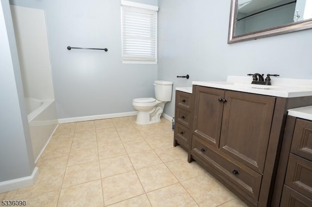 bathroom featuring tile patterned flooring, vanity, and toilet