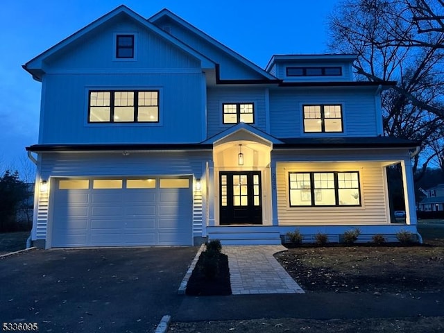 view of front of property featuring a garage