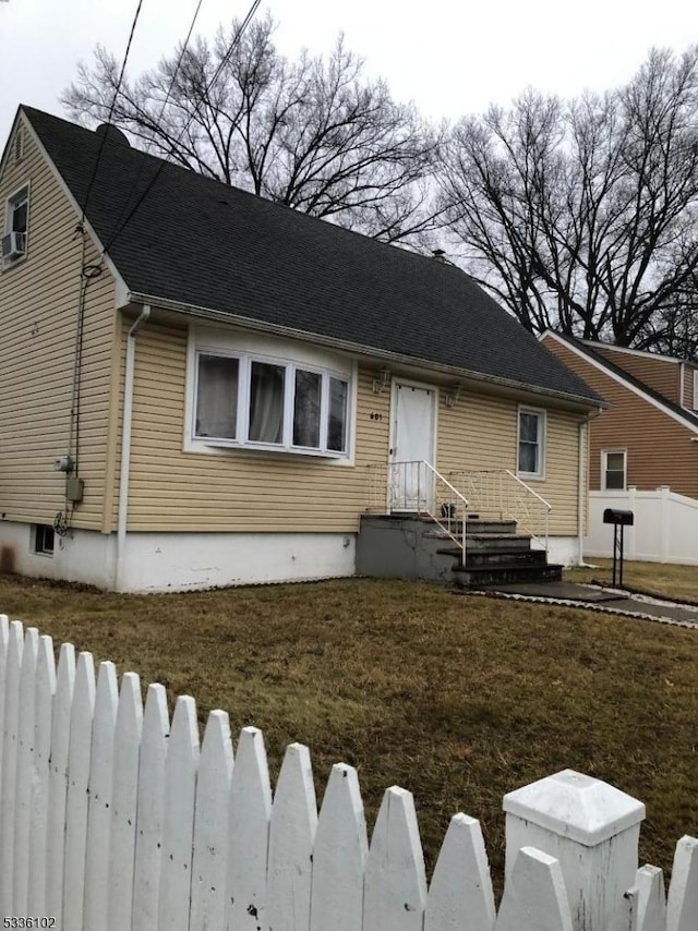 view of front of home with a front lawn