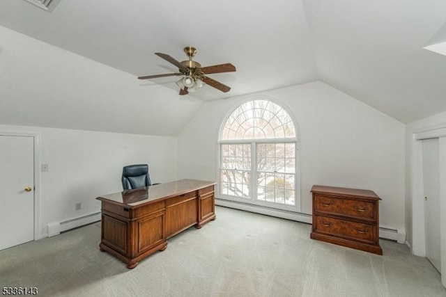 home office featuring lofted ceiling, a baseboard heating unit, and light carpet