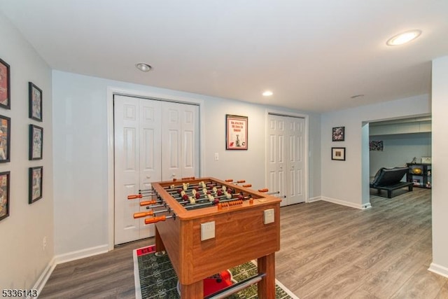 playroom with hardwood / wood-style flooring