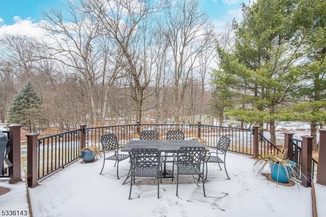 view of snow covered deck