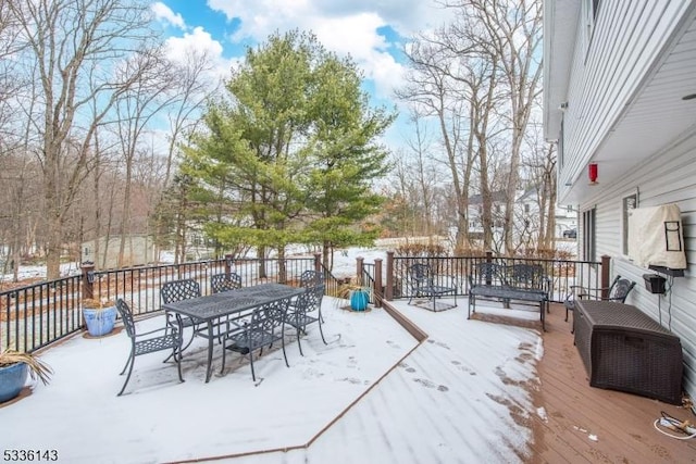 view of snow covered deck