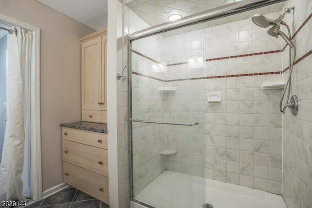 bathroom featuring tile patterned floors and walk in shower