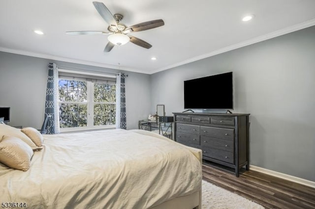 bedroom with ceiling fan, ornamental molding, and dark hardwood / wood-style flooring