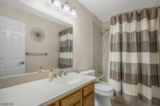 full bathroom with shower / tub combo with curtain, toilet, and vanity