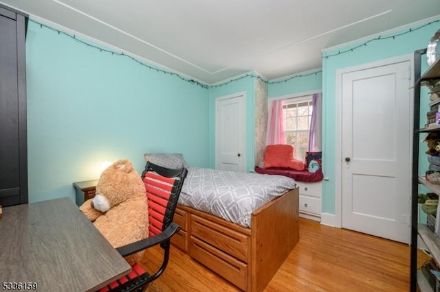 bedroom featuring light wood-type flooring