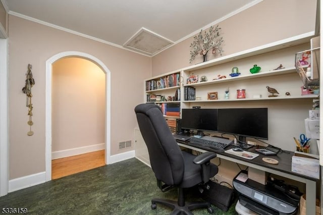 office featuring attic access, baseboards, visible vents, and ornamental molding