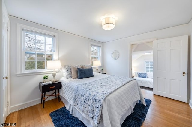 bedroom featuring hardwood / wood-style flooring