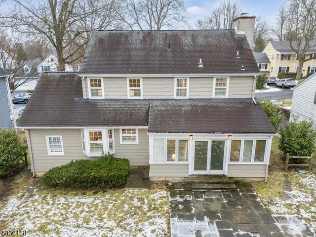 back of property with a patio area