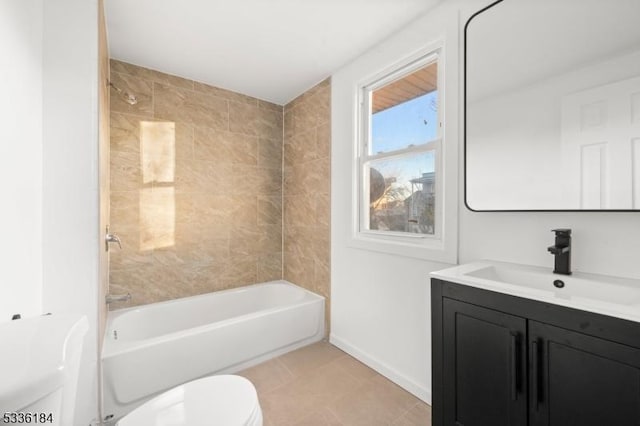 full bathroom with vanity, tile patterned floors, toilet, and tiled shower / bath