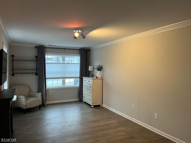 unfurnished room with ornamental molding and dark hardwood / wood-style floors