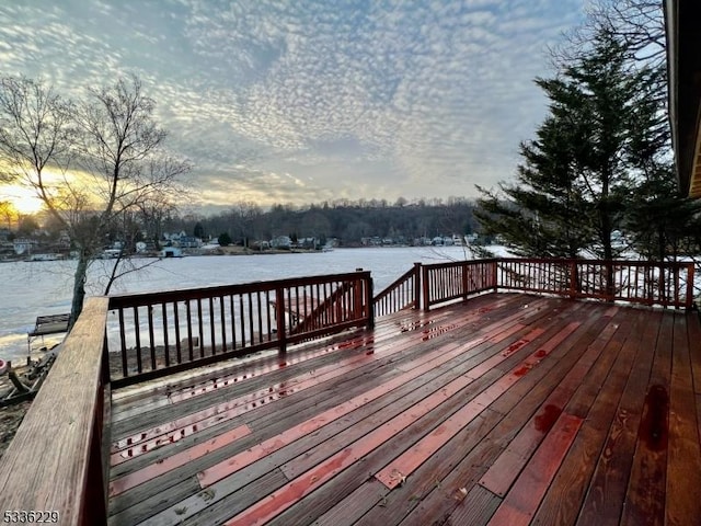 deck at dusk with a water view