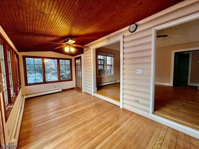 unfurnished sunroom with baseboard heating, lofted ceiling, and wooden ceiling