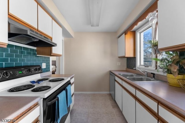 kitchen with under cabinet range hood, decorative backsplash, electric range, white cabinetry, and a sink