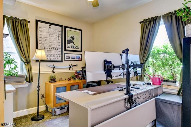 office featuring a wealth of natural light and ceiling fan