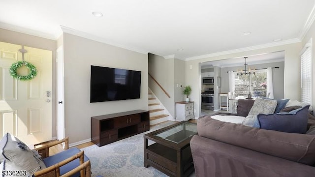 living room featuring recessed lighting, baseboards, ornamental molding, and stairs