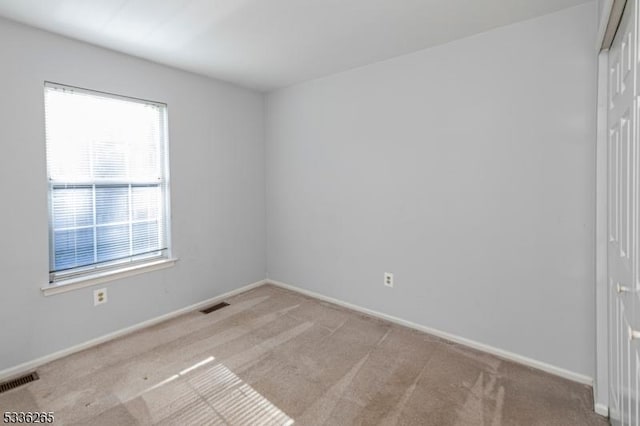 view of carpeted spare room