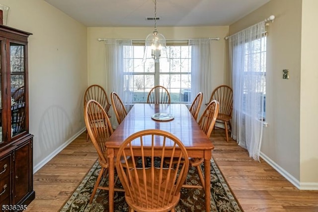 dining room featuring light wood-type flooring