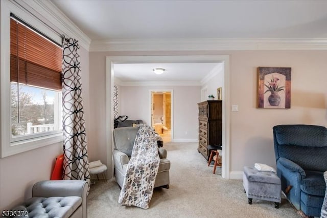 living area featuring light carpet and ornamental molding