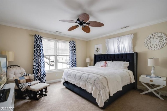 bedroom featuring crown molding, ceiling fan, and carpet