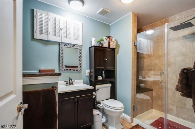 bathroom featuring walk in shower, vanity, and toilet