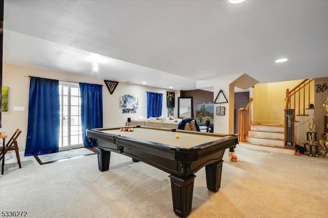 game room featuring pool table and light colored carpet