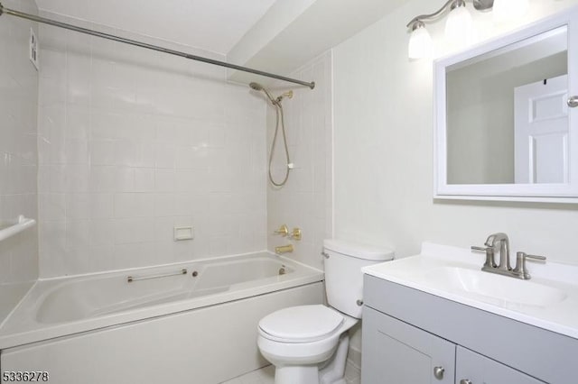 full bathroom with vanity, toilet, and tiled shower / bath