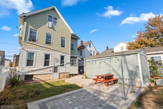 back of house featuring a patio