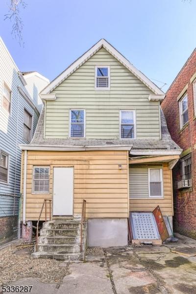 rear view of property featuring a patio area