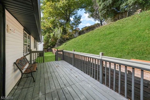 deck featuring a yard