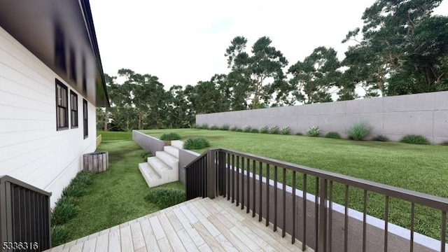 wooden terrace featuring a yard