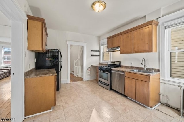 kitchen with appliances with stainless steel finishes and sink