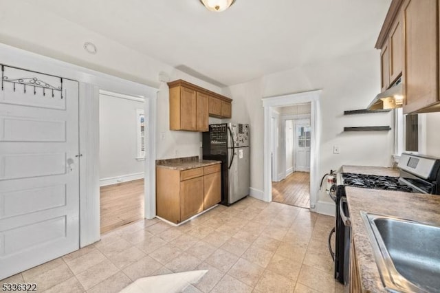 kitchen featuring appliances with stainless steel finishes and sink