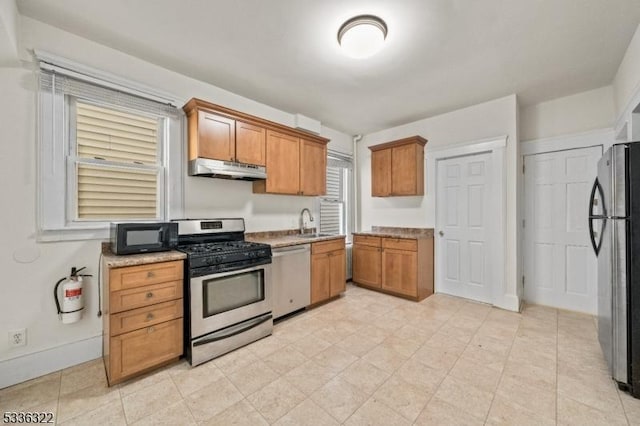 kitchen featuring appliances with stainless steel finishes and sink