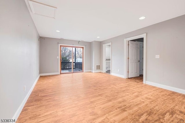 unfurnished room featuring light wood-type flooring