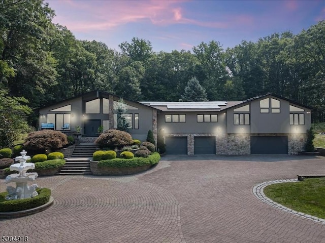 view of front of home with a garage