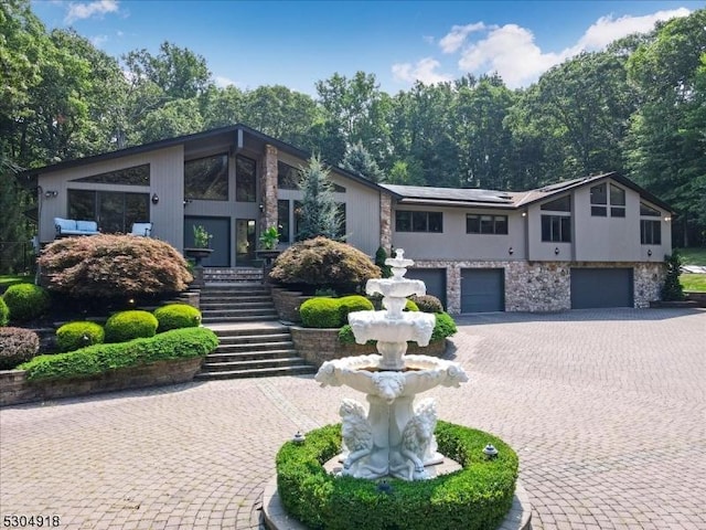 view of front of home with a garage