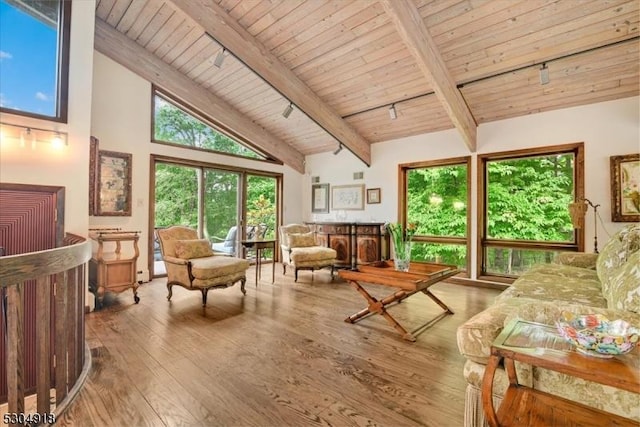 interior space featuring wood ceiling, beam ceiling, and light hardwood / wood-style floors