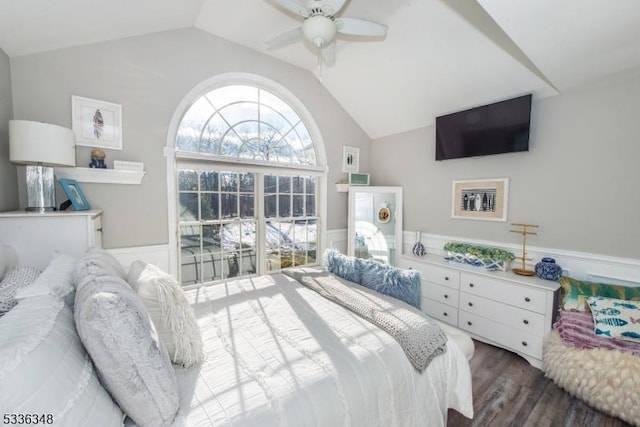 bedroom with ceiling fan, lofted ceiling, and dark hardwood / wood-style flooring