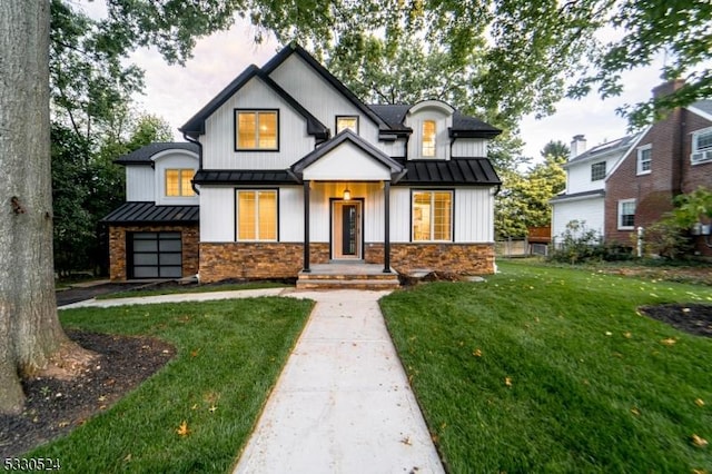 modern farmhouse with a garage and a front lawn