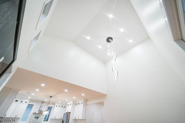 room details featuring stainless steel fridge with ice dispenser