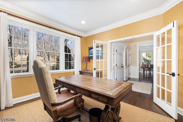 dining area featuring french doors, wood finished floors, and crown molding